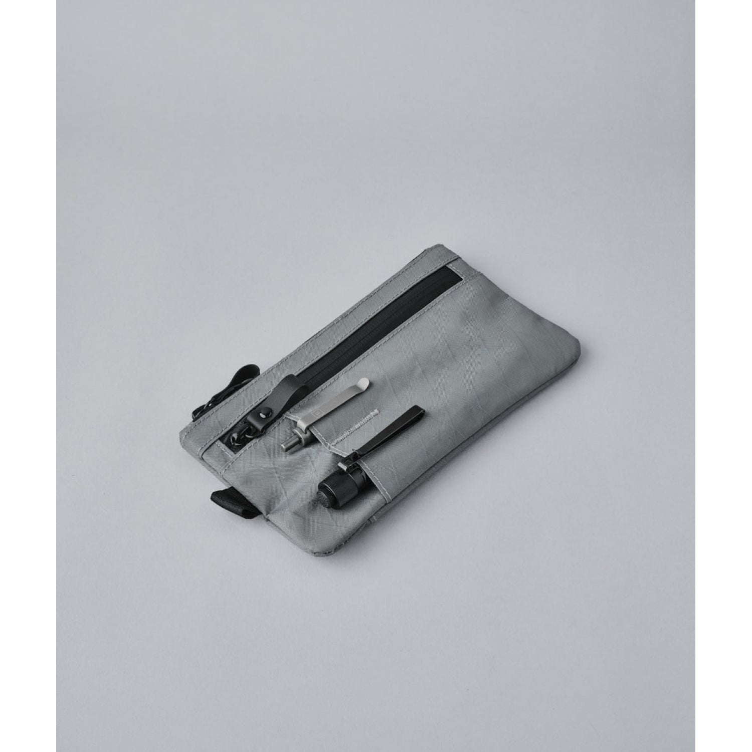 ALPAKA Zip Clutch + Hand Carry Strap