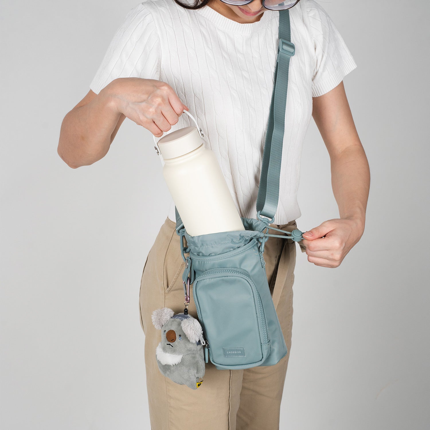 Crossing Water Bottle Crossbody Bag With Front Pocket 2L