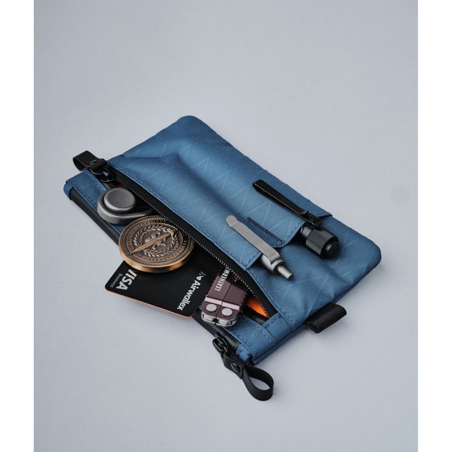 ALPAKA Zip Clutch + Hand Carry Strap