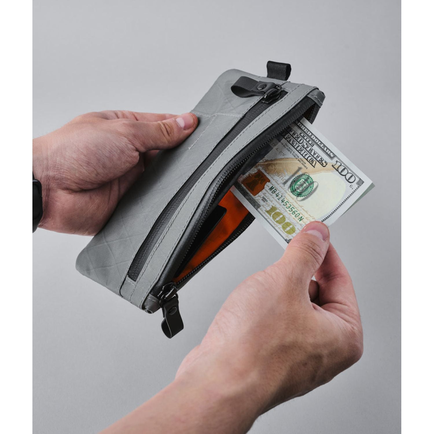 ALPAKA Zip Clutch + Hand Carry Strap